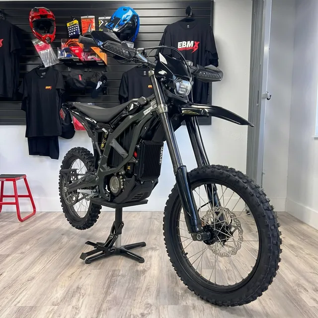 E-moto rider with Torq Racing titanium bolt kit installed