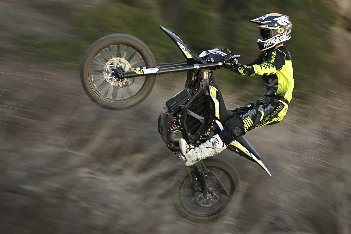 Rider on a Surron e-moto